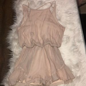 Open back cream romper